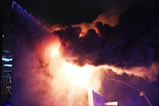 Russia Terrorist Attack 8647884 22.03.2024 Firefighters work to extinguish fire at the burning Crocus City Hall concert venue following a shooting incident, outside Moscow, Russia. The Russian Federal Security Service (FSB) said that there are people dead and injured as a result of the terrorist attack in the concert hall in Moscow region. A massive fire has also broken out at the venue. Sergey Bobylev Sputnik Moscow region Russia  Copyright: xSergeyxBobylevx