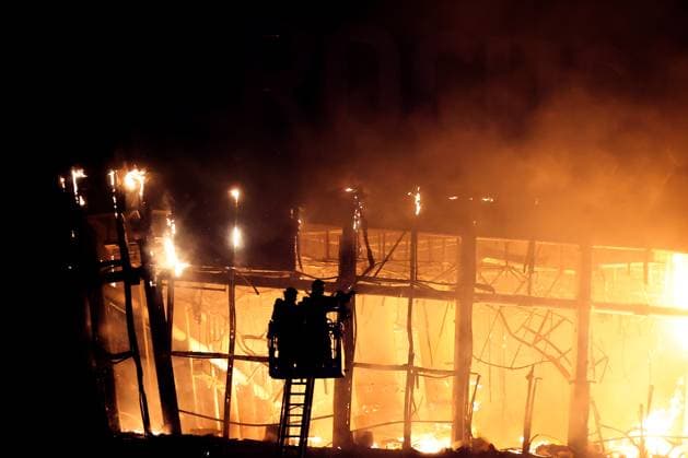 March 22, 2024. Russia, Moscow Region, Krasnogorsk. Firefighters battle a fire at the Crocus City Hall in the town of Krasnogorsk after a mass shooting by several unidentified gunmen. Evacuation is underway. DmitryxGolubovich