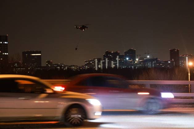RUSSIA, MOSCOW REGION - MARCH 22, 2024: A helicopter is on its way to battle a fire at the Crocus City Hall in the town of Krasnogorsk after a mass shooting by several unidentified gunmen. Evacuation is underway. Vladimir Gerdo TASS  68460449