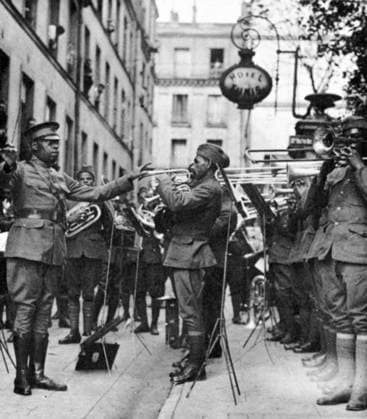 WORLD WAR I: BLACK BAND. Lieutenant James Reese Europe conducting the 369th Regimental Band outside American Red Cross Hospital No. 9 in Paris, 1918.  Copyright: xGRANGERx xGRANGERx 0068957