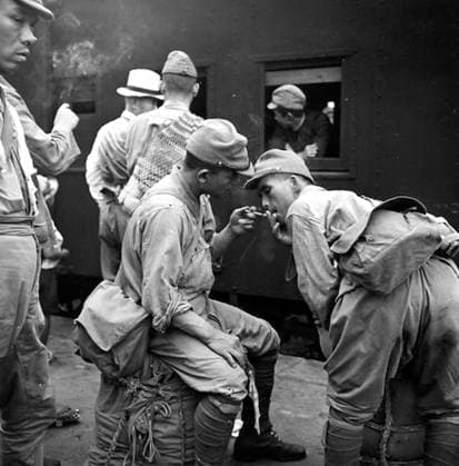 China: Second Sino-Japanese War (1937-1945). Japanese troops waiting for a troop train to depart. The Second Sino-Japanese War (July 7, 1937 September 9, 1945) was a military conflict fought primarily between the Republic of China and the Empire of Japan. After the Japanese attack on Pearl Harbor, the war merged into the greater conflict of World War II as a major front of what is broadly known as the Pacific War. Although the two countries had fought intermittently since 1931, total war started in earnest in 1937 and ended only with the surrender of Japan in 1945.<br ><br > The war was the result of a decades-long Japanese imperialist policy aiming to dominate China politically and militarily and to secure its vast raw material reserv Copyright: xxPicturesxFromxHistoryx