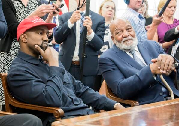 Kanye West, left, listens as he meets with United States President Donald J. Trump and Jim Brown, right, in the Oval Office of the White House in Washington, DC on Thursday, October 11, 2018. Credit: Ron Sachs CNP EDITORIAL USE ONLY Copyright: xx x cnpphotos137866