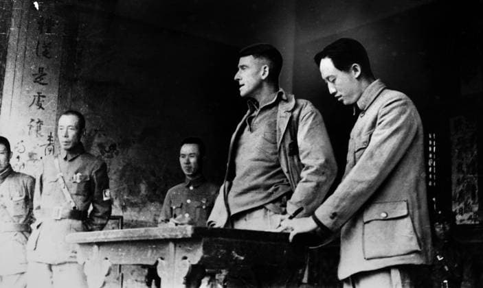 EVANS F. CARLSON (1896-1947). Carlson, a U.S. Marine Corps Brigadier General, meeting with leaders of the Chinese Eighth Army during the Sino-Japanese War. Photographed 29 December 1938.  Copyright: xGRANGERx xGRANGERx 0109910