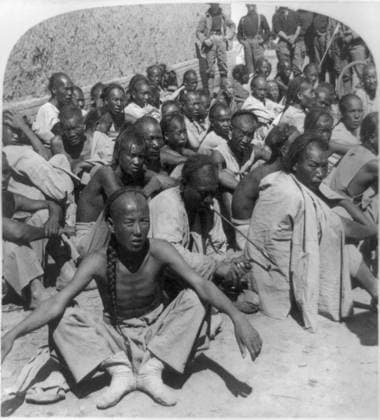 CHINA: BOXER REBELLION. Captured Boxer rebels brought in by the 6th U.S. Cavalry, Tientsin, China. Stereograph, c1901.  Copyright: xGRANGERx xGRANGERx 0115735