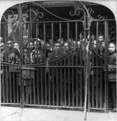 CHINA: BOXER REBELLION. Watching the Foreign Devils at the Gate of the English Bridge barring the Cantonese from the Legations, China. Stereograph, c1900.  Copyright: xGRANGERx xGRANGERx 0115977