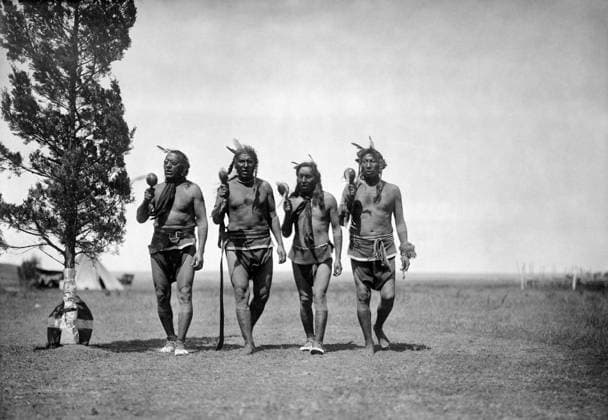NIGHT MEDICINE MEN, c1908. A group of four night medicine men of the Arikara tribe walking together, in traditional dress. Photographed by Edward S. Curtis, c1908.  Copyright: xGRANGERx xGRANGERx 0119466