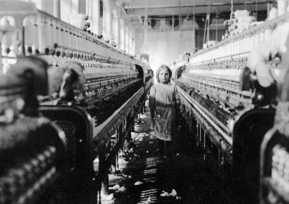 CHILD LABOR, 1908. A girl working as a spinner at a textile mill in Newberry, South Carolina. Photographed in 1908 by Lewis W. Hine.  Copyright: xGRANGERx xGRANGERx 0119939