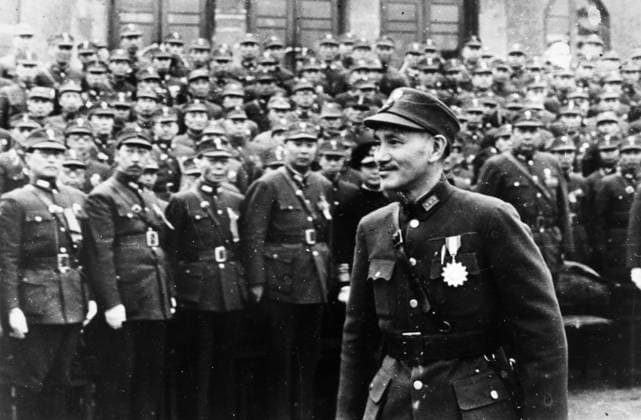 CHIANG KAI-SHEK (1887-1975). Chinese general and politician. Photographed while reviewing Chinese troops during World War II, c1943.  Copyright: xGRANGERx xGRANGERx 0121287