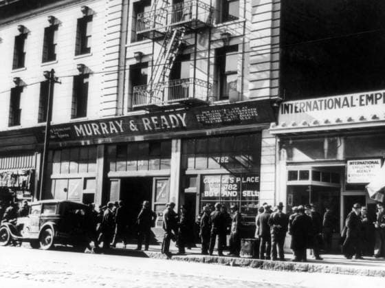 EMPLOYMENT OFFICE, 1937. Job applicants waiting outside the International Employment Agency on Howard Street in San Francisco, known as Skid Row, the district of the unemployed. Photograph by Dorothea Lange, February 1937.  Copyright: xGRANGERx xGRANGERx 0124004