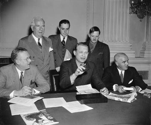 DIES COMMITTEE, 1938. Members of the House Un-American Activities Committee (HUAC), also known as the Dies Committee, at the final hearing of 1938. Seated, left to right: Rep. Harold Mosier, Chairman Martin Dies and Rep. J Parnell Thomas. Standing: Rep. John J. Depmsey, Committee Secretary Robert Stripling and Chief Investigator John Metcalf.  Copyright: xGRANGERx xGRANGERx 0128873