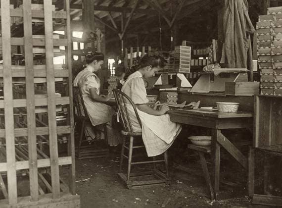 CIGAR BOX FACTORY, 1909. Young girls working at the Tampa Cigar Box Factory in Tampa, Florida. Photograph by Lewis Hine, January 1909.  Copyright: xGRANGERx xGRANGERx 0166688