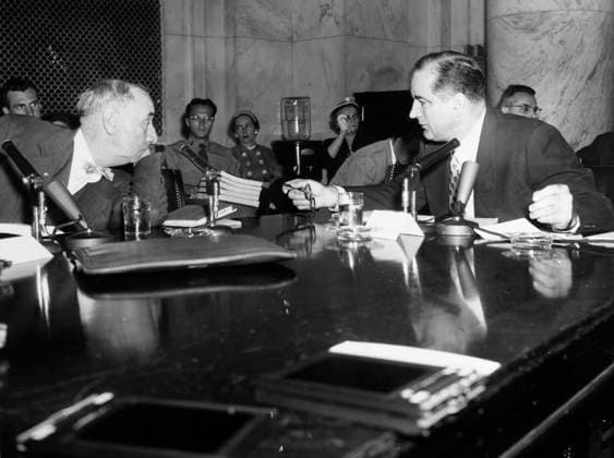 WELCH AND McCARTHY, 1954. U.S. Army counsel Joseph Welch (left) and Senator Joseph McCarthy gesture as they talk during the hearings of the Senate Investigations Subcommittee in the Army-McCarthy investigation in Washington, D.C. Photograph, 1 June 1954.  Copyright: xGRANGERx xGRANGERx 0174799