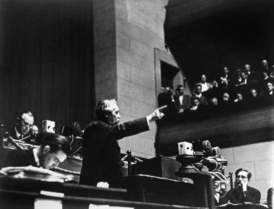 ARISTIDE BRIAND (1862-1932). French statesman. Briand delivering a speech on disarmament before the Ninth Assembly of the League of Nations in the Hall of the Reformation, Geneva, Switzerland, while serving as French Minister of Foreign Affairs, September 1928. Photographed by Erich Salomon.  Copyright: xGRANGERx xGRANGERx 0176254