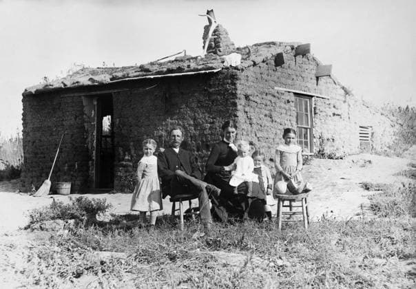 NEBRASKA: SETTLERS, 1888. The Samphere family in front of their sod house in Custer County, Nebraska. Photograph by Solomon D. Butcher, 1888.  Copyright: xGRANGERx xGRANGERx 0176492