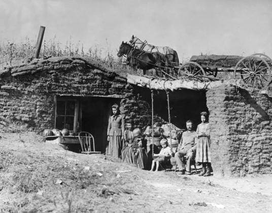 NEBRASKA: SETTLERS, 1892. A homesteader family in front of their sod house dugout on the South Loup River, Custer County, Nebraska. Photograph by Solomon D. Butcher, 1892.  Copyright: xGRANGERx xGRANGERx 0176493