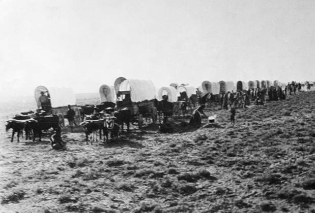 COLORADO GOLD RUSH, c1860. Covered wagons moving across the Great Plains on their way to Pike s Peak at the time of the Colorado Gold Rush. Photographed c1860.  Copyright: xGRANGERx xGRANGERx 0184092
