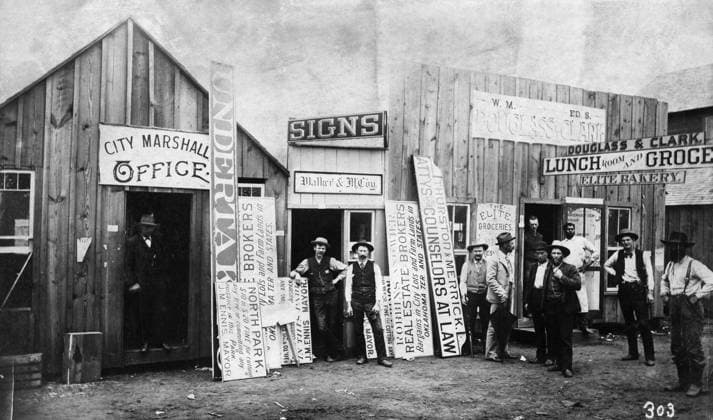 OKLAHOMA: GUTHRIE, 1889. The City Marshall s office, Walk & McCoy Sign Painter s, and the Douglass & Clark Lunch Room in Guthrie, Oklahoma Territory. Photograph, 1889.  Copyright: xGRANGERx xGRANGERx 0186485