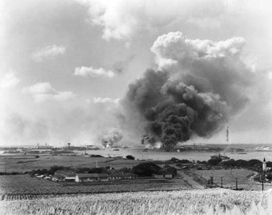 WWII: PEARL HARBOR, 1941. A view of the Pearl Harbor Navy Yard during the Japanese air raid. Photograph, 7 December 1941.  Copyright: xGRANGERx xGRANGERx 0216877
