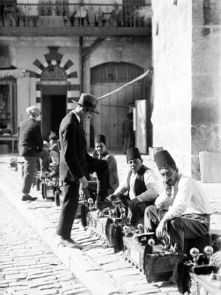 Palestine: Shoeshiners at the Jaffa Gate, Jerusalem, c. 1920 Palestine (Arabic: ÙÙ Ø³Ø·ÙäÙÜŽ Filasá¹­Ä«n, Falasá¹­Ä«n, Filisá¹­Ä«n; Greek: Î Î±Î»Î±Î¹ÏƒÏ Î¯Î½Î·, PalaistinÄ ; Latin: Palaestina; Hebrew: ×¤×œ× ×ª×™× × Palestina) is a n ame given to the geographic region between the Mediterranean Sea and the Jordan River. The region is also known as the Land of Israel (Hebrew: ××¨×¥Ö¾×™× ×¨××œ Eretz-Yisra el), the Holy Land and the Southern Levant.<br ><br > In 1832 Palestine was conquered by Muhammad Ali s Egypt, but in 1840 Britain intervened and returned control of the Levant to the Ottomans in return for further capitulations. The end of the 19th century saw the beginning of Zionist immigration and the Revival of the Hebrew language. Copyright: xxPicturesxFromxHistoryx
