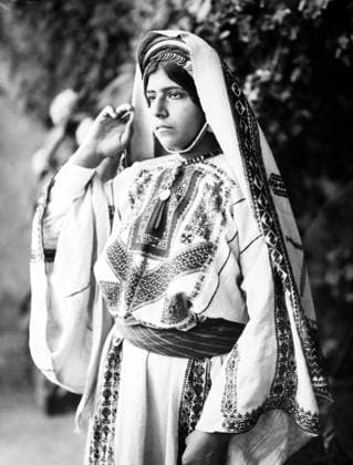 Palestine: A Palestinian woman of Ramallah wearing an embroidered dress, c. 1915 Palestine (Arabic: ÙÙ Ø³Ø·ÙäÙÜŽ Filasá¹­Ä«n, Falasá¹­Ä«n, Filisá¹­Ä«n; Greek: Î Î±Î»Î±Î¹ÏƒÏ Î¯Î½Î·, PalaistinÄ ; Latin: Palaestina; Hebrew: ×¤×œ× ×ª×™× × Palestina) is a n ame given to the geographic region between the Mediterranean Sea and the Jordan River. The region is also known as the Land of Israel (Hebrew: ××¨×¥Ö¾×™× ×¨××œ Eretz-Yisra el), the Holy Land and the Southern Levant.<br ><br > In 1832 Palestine was conquered by Muhammad Ali s Egypt, but in 1840 Britain intervened and returned control of the Levant to the Ottomans in return for further capitulations. The end of the 19th century saw the beginning of Zionist immigration and the Revival of Copyright: xxPicturesxFromxHistoryx