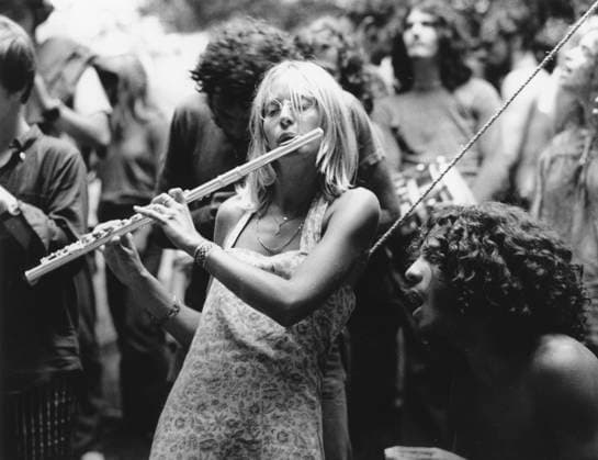 HIPPIE MOVEMENT, 1969. A woman plays the flute with other musicians at the Woodstock music festival in New York State. Full credit: Richard Busch Granger, NYC -- All rights resrk.  Copyright: xRichardxBuschx xGRANGERx 0265630