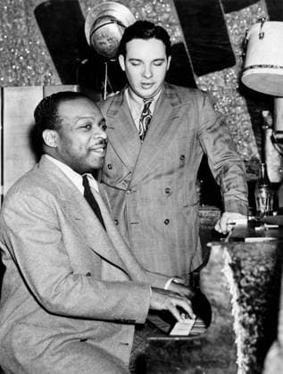 COUNT BASIE (1904-1984). American musician and orchestra leader. With Bob Crosby at the Howard Theatre in Washington D.C., c1941. Photograph by William P. Gottlieb, c1941.  Copyright: xGRANGERx xGRANGERx 0267115