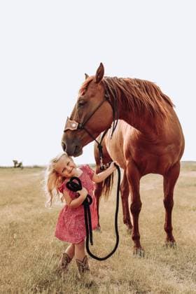 Creative Highlights Symbolbilder 3 year old sassy blonde cowgirl & red Winifred, Montana, United States CR_NXPS240325C-1377906-01 ,model released, Symbolfoto