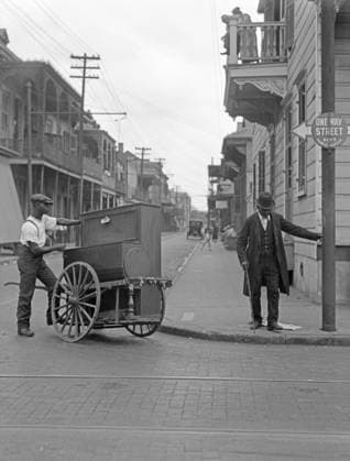 NEW ORLEANS, c1925. An organ grinder on the street in New Orleans, Louisiana. Photograph by Arnold Genthe, c1925.  Copyright: xGRANGERx xGRANGERx 0527355