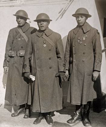 WWI: HOMECOMING, 1919. Major J.R. White, Lieutenant Colonel Otis B. Duncan, and Lieutenant W.J. Warfield of the 369th and 370th Infantry Regiments returning home aboard the SS France. Photograph, February 1919.  Copyright: xGRANGERx xGRANGERx 0528279