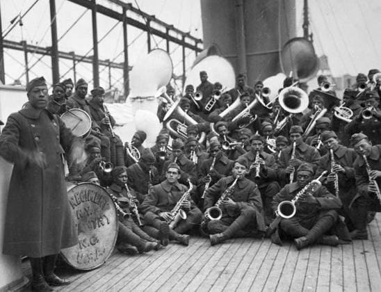 WWI: HOMECOMING, 1919. Lieutenant James Reese Europe with the regimental band of the 369th Infantry Regiment returning home aboard the SS Stockholm. Photograph, February 1919.  Copyright: xGRANGERx xGRANGERx 0528289