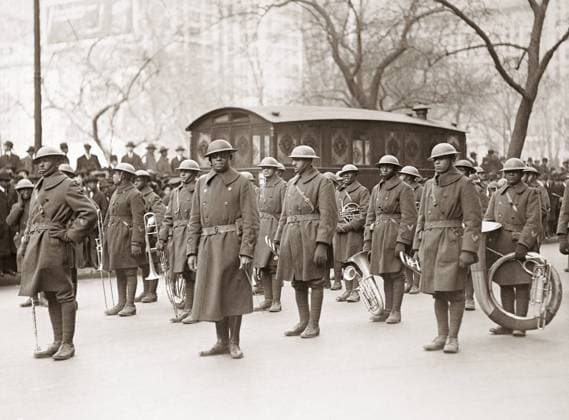 WWI: BAND, 1919. Lieutenant James Reese Europe with the regimental band of the 369th Infantry Regiment, at a homecoming parade in New York City. Photograph, February 1919.  Copyright: xGRANGERx xGRANGERx 0528299