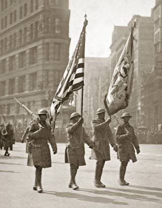 WWI: PARADE, 1919. Color bearers of the 369th Infantry Regiment at the start of the parade up Fifth Avenue in New York City. Photograph, 17 February 1919.  Copyright: xGRANGERx xGRANGERx 0528309