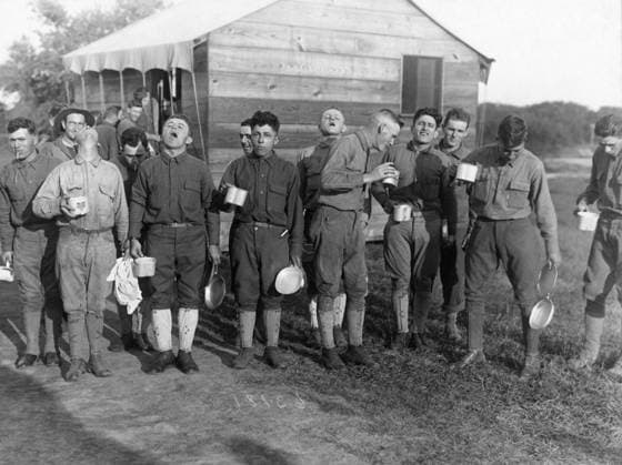 FLU PANDEMIC, 1918. Men at Camp Dix in New Jersey gargling salt water as a preventative measure against influenza. Photograph, September 1918.  Copyright: xGRANGERx xGRANGERx 0529212