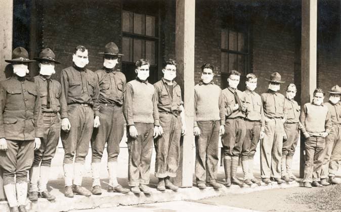 FLU PANDEMIC, 1918. Members of the U.S. Army Medical Corps and Quartermaster Corps outside of the hospital at Fort Porter in Buffalo, New York. Photograph, November 1918.  Copyright: xGRANGERx xGRANGERx 0529219