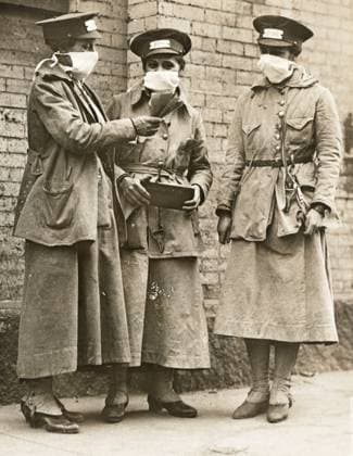 FLU PANDEMIC, 1918. A group of street car conductors in New York City wearing a face mask during the influenza pandemic. Photograph, October 1918.  Copyright: xGRANGERx xGRANGERx 0529227