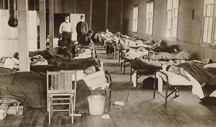 FLU PANDEMIC, 1918. Influenza patients in the barracks hospital at Colorado Agricultural College in Fort Collins, Colorado, during the influenza pandemic. Photograph, 1918.  Copyright: xGRANGERx xGRANGERx 0529256