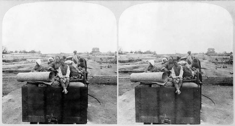 CHINA: BOXER REBELLION. Chinese Christians leaving Beijing during the Boxer Rebellion in China. Stereograph, c1902.  Copyright: xGRANGERx xGRANGERx 0622233