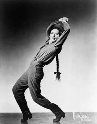 AGNES DE MILLE (1905-1993). Agnes George de Mille. American dancer and choreographer. De Mille making a guest appearance in the role of Cowgirl in the American Ballet Theatre production of Rodeo. Photograph by Maurice Seymour, 1951.  Copyright: xGRANGERx xGRANGERx 0623488
