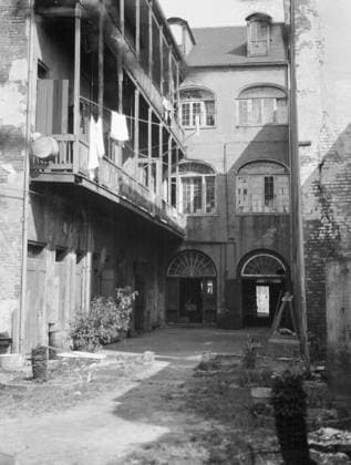 NEW ORLEANS: COURTYARD. Galleries and fan windows in a courtyard in New Orleans, Louisiana. Photograph by Arnold Genthe, c1923.  Copyright: xGRANGERx xGRANGERx 0636809