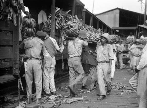 NEW ORLEANS: BANANAS, c1923. Workers unloading a shipment of bananas in New Orleans, Louisiana. Photograph by Arnold Genthe, c1923.  Copyright: xGRANGERx xGRANGERx 0636811