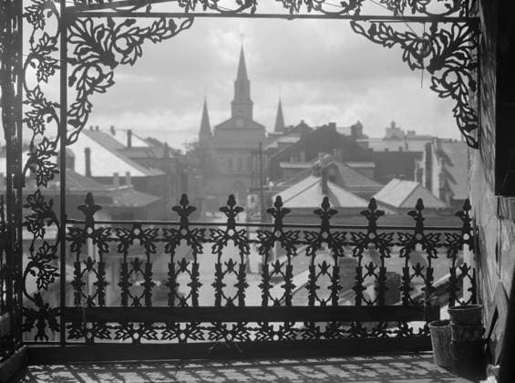NEW ORLEANS: WROUGHT IRON. City view through wrought ironwork on a balcony in New Orleans, Louisiana. Photograph by Arnold Genthe, c1923.  Copyright: xGRANGERx xGRANGERx 0636813