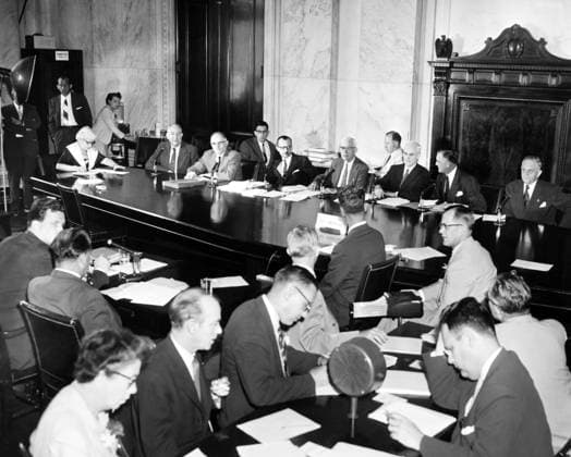 JOSEPH McCARTHY (1887-1978). American politician. Senator McCarthy facing members of a special Senate council investigating McCarthy s conduct. Across the table from left: Samuel Ervin, Francis Case, Guy De Furia, Wallace Chadwick, Arthur V. Watkins, John Stennis, and Frank Carlson. Photograph, 2 September 1954.  Copyright: xGRANGERx xGRANGERx 0640320