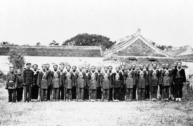 CHINA: BOXER REBELLION. Boxer soldiers posed with rifles, possibly among those who opposed British Admiral Edward Seymour s expedition to Beijing. Photograph, c1900.  Copyright: xGRANGERx xGRANGERx 0640863