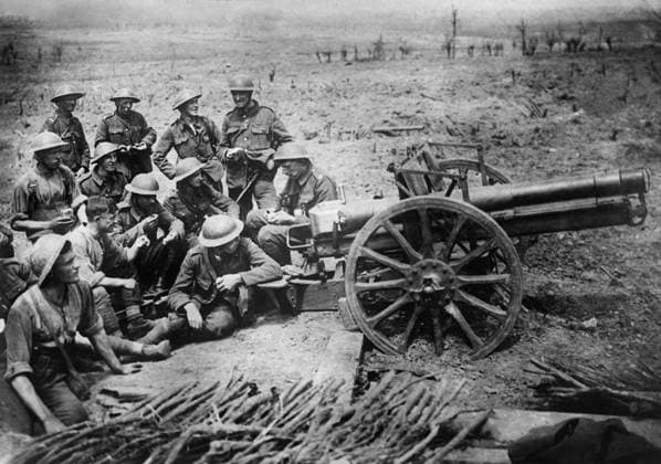 WWI: BATTLE OF MESSINES, 1917. British soldiers rest next to a captured German field gun near Wytschaete, Flanders during the Battle of Messines. Photograph by John Warwick Brooke, 10 June 1917.  Copyright: xGRANGERx xGRANGERx 0644683