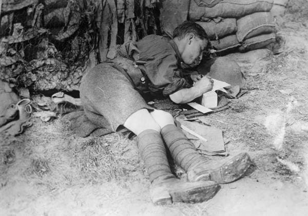 WWI: BATTLE OF MESSINES, 1917. A British officer writing a letter in a captured German trench during the Battle of Messines, Oostaverne Wood, Belgium. Photograph by Ernest Brooks, 11 June 1917.  Copyright: xGRANGERx xGRANGERx 0644684