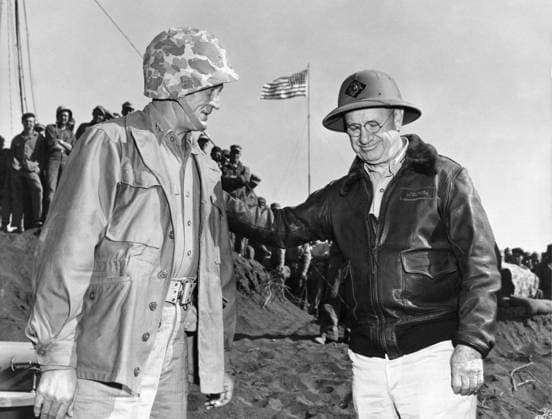 WWII: IWO JIMA, 1945. United States Marine Corps generals Graves Erskine (left) and Holland Smith (right) on a beach at the end of the Battle of Iwo Jima. Photograph from the United States Marine Corps, 14 March 1945.  Copyright: xGRANGERx xGRANGERx 0644836