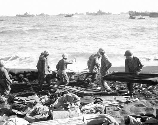 WWII: IWO JIMA, 1945. Medics transporting a wounded marine by stretcher during the Battle of Iwo Jima. Photograph from the United States Marine Corps, February 1945.  Copyright: xGRANGERx xGRANGERx 0644844