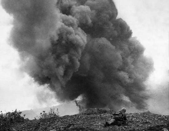 WWII: IWO JIMA, 1945. An American Marine hunkers down against the detonation of a mine placed by Japanese defenders during the Battle of Iwo Jima. Photograph from the United States Marin Corps, February 1945.  Copyright: xGRANGERx xGRANGERx 0644939