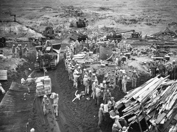 WWII: IWO JIMA, 1945. American Marines transporting supplies onto a beachhead during the Battle of Iwo Jima. Photograph from the United States Marine Corps, 1945.  Copyright: xGRANGERx xGRANGERx 0645026