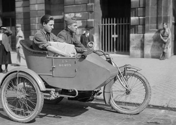 WWI: DELIVERY BOYS, 1918. Boy Scouts from the American Red Cross delivering supplies to other Red Cross offices in Paris, France. Photograph, 1918.  Copyright: xGRANGERx xGRANGERx 0646170